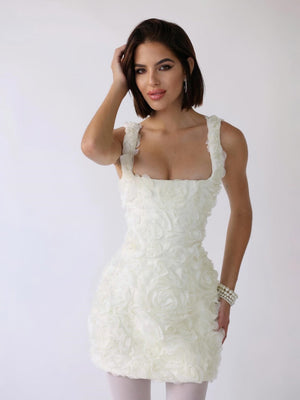 Minivestido con corsé y apliques florales en blanco