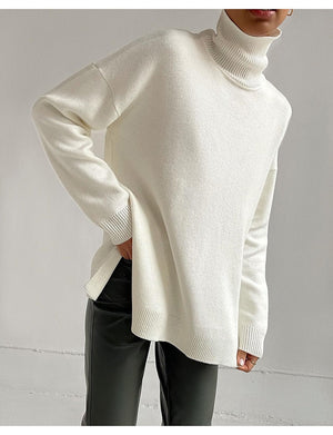 Blusa oversize de malla con cuello alto