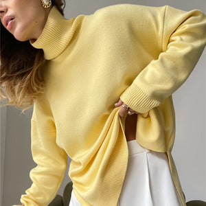 Blusa oversize de malla con cuello alto