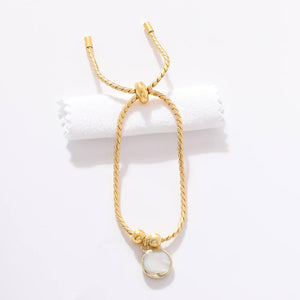 Pulsera Piedra Blanca Cordón Acero Dorado